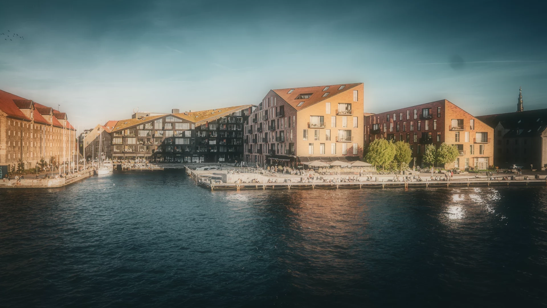 Warm afternoon light on Copenhagen’s canal and waterfront buildings