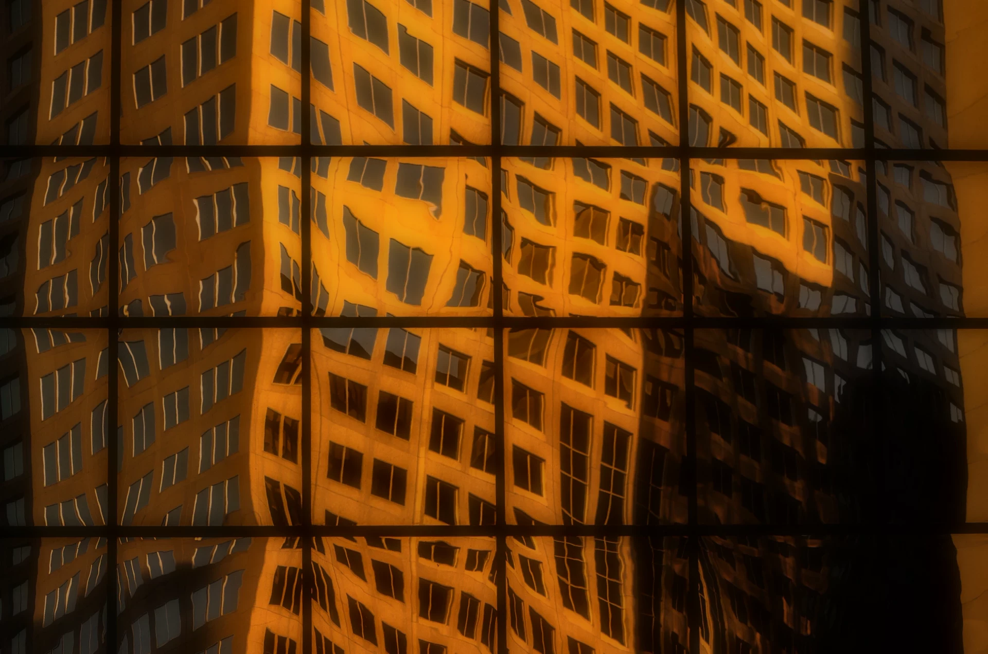 Light reflected across a glass building
